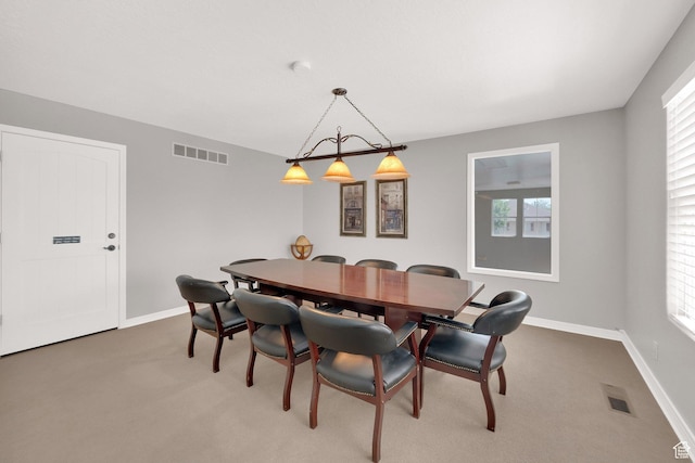 3908 W Lorient Ave, West Jordan, UT 84084 - dining room featuring carpet and healthy amount of natural light