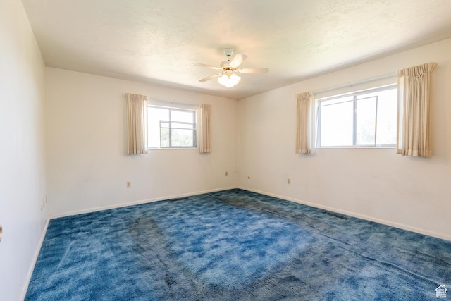 85 E 500 S, Providence, UT 84332 - unfurnished room featuring ceiling fan and dark carpet