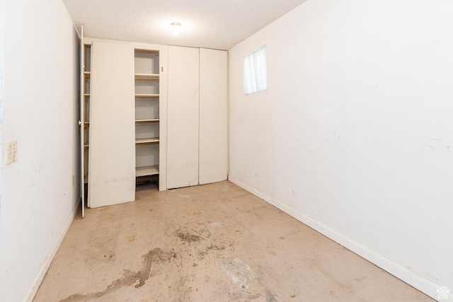 85 E 500 S, Providence, UT 84332 - unfurnished bedroom with concrete floors and baseboards