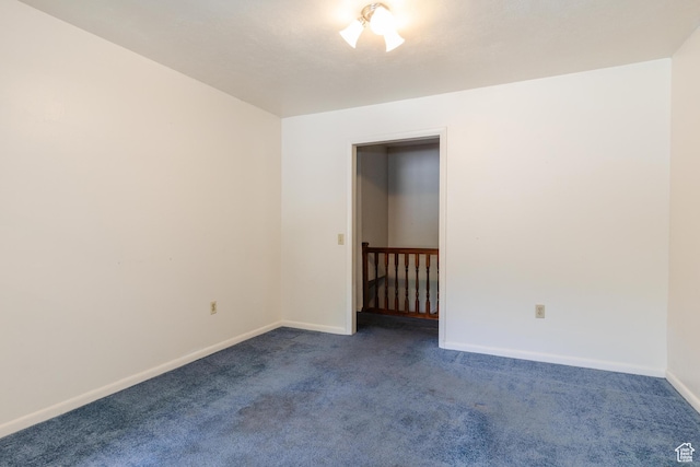 85 E 500 S, Providence, UT 84332 - spare room with dark colored carpet and baseboards
