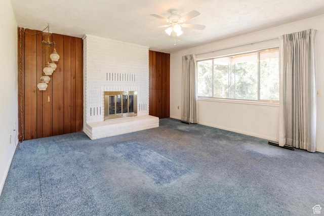85 E 500 S, Providence, UT 84332 - unfurnished living room with a ceiling fan, carpet floors, and a brick fireplace