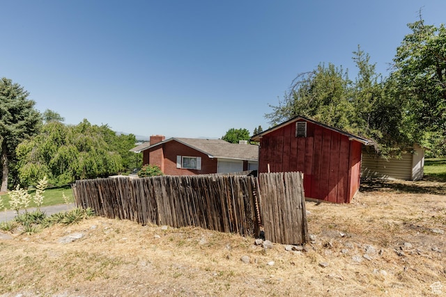 85 E 500 S, Providence, UT 84332 - view of side of home featuring a storage shed