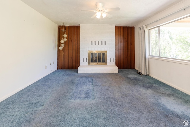 85 E 500 S, Providence, UT 84332 - unfurnished living room with ceiling fan, a fireplace, and carpet flooring