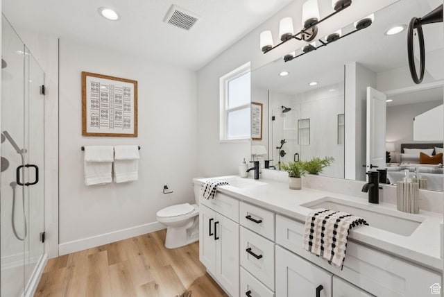932 W Walden Meadows Dr S, Salt Lake City, UT 84123 - full bath featuring a stall shower, double vanity, wood finished floors, and recessed lighting