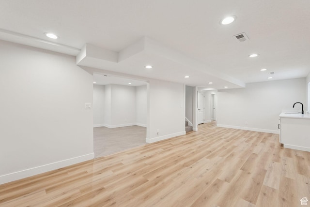 932 W Walden Meadows Dr S, Salt Lake City, UT 84123 - finished below grade area with recessed lighting, stairway, and light wood-style floors