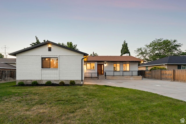 932 W Walden Meadows Dr S, Salt Lake City, UT 84123 - view of front facade with brick siding and a porch