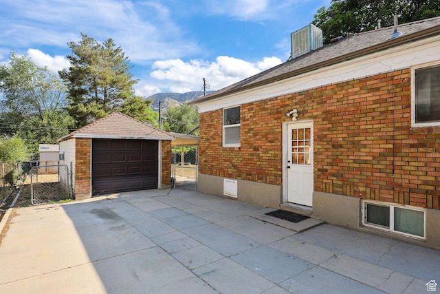 437 E 100 N, Brigham City, UT 84302 - detached garage with a gate and driveway
