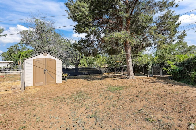 437 E 100 N, Brigham City, UT 84302 - fenced backyard featuring a shed