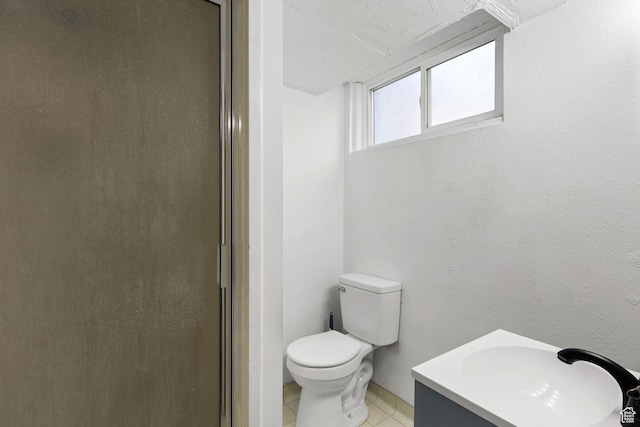 437 E 100 N, Brigham City, UT 84302 - full bath featuring vanity, tile patterned flooring, and a shower with shower door