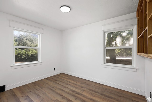 437 E 100 N, Brigham City, UT 84302 - unfurnished room featuring dark wood-style floors