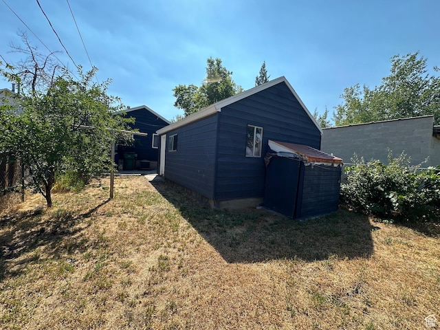 2019 Adams Ave, Ogden, UT 84401 - view of side of property with a yard