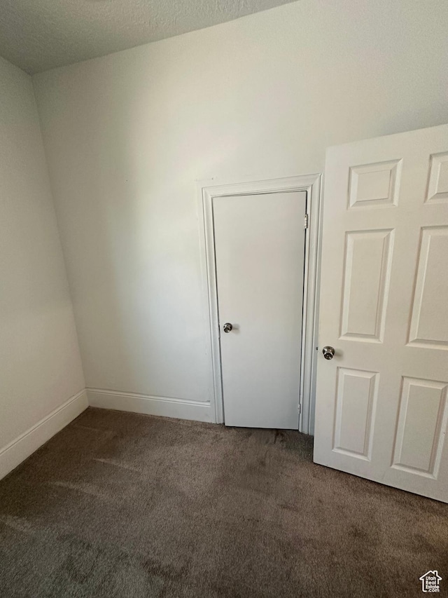 2019 Adams Ave, Ogden, UT 84401 - spare room featuring carpet flooring
