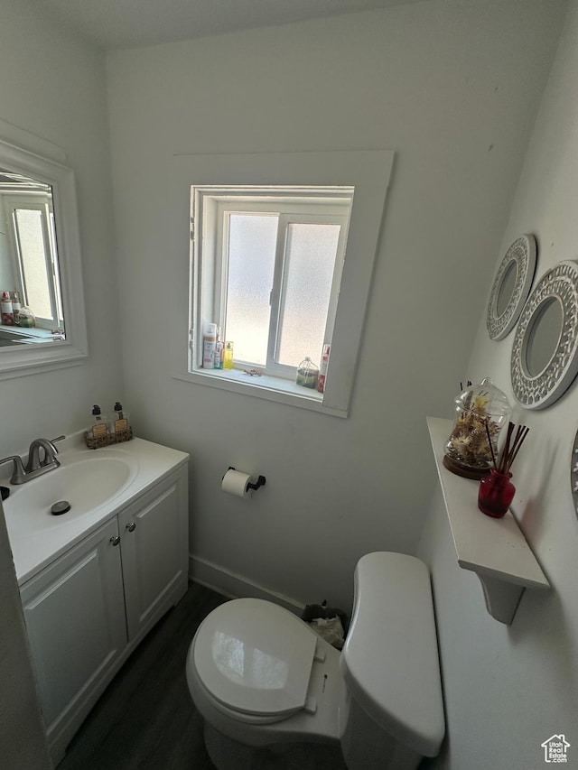 2019 Adams Ave, Ogden, UT 84401 - half bath with vanity and wood finished floors