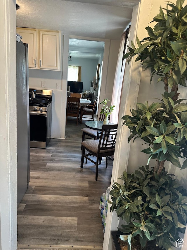 2019 Adams Ave, Ogden, UT 84401 - hall featuring dark wood-type flooring