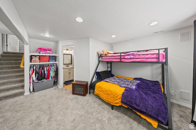4022 S 2725 W, Roy, UT 84067 - carpeted bedroom featuring recessed lighting and ensuite bath