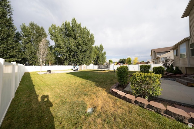 4022 S 2725 W, Roy, UT 84067 - fenced backyard featuring a trampoline