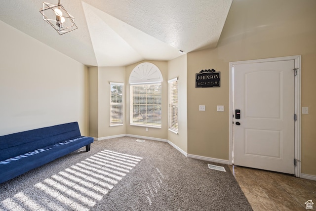 4022 S 2725 W, Roy, UT 84067 - entrance foyer featuring vaulted ceiling and a textured ceiling