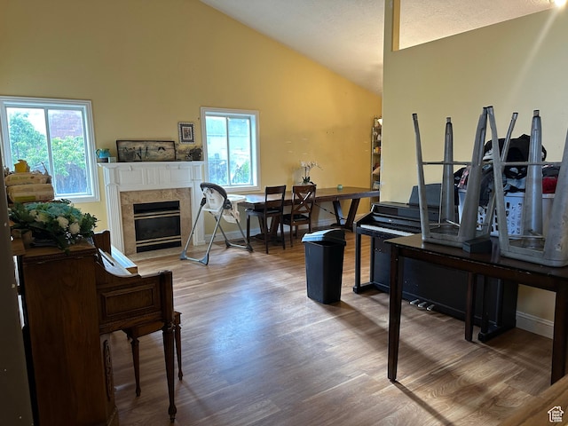 83 E 1820 S, Orem, UT 84058 - living room with wood finished floors, a fireplace, and high vaulted ceiling