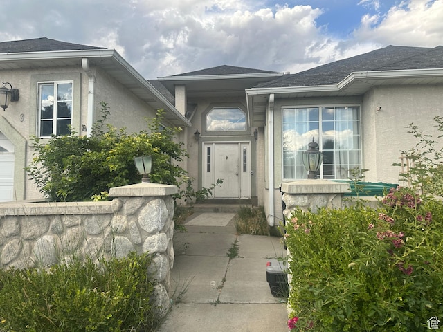 83 E 1820 S, Orem, UT 84058 - property entrance featuring stucco siding and a shingled roof