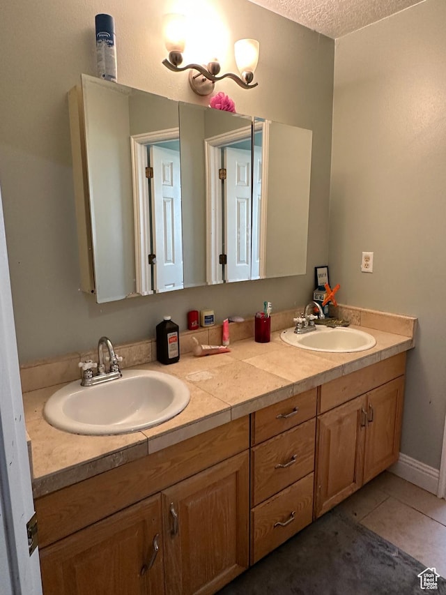 83 E 1820 S, Orem, UT 84058 - full bathroom with double vanity, a textured ceiling, and tile patterned flooring