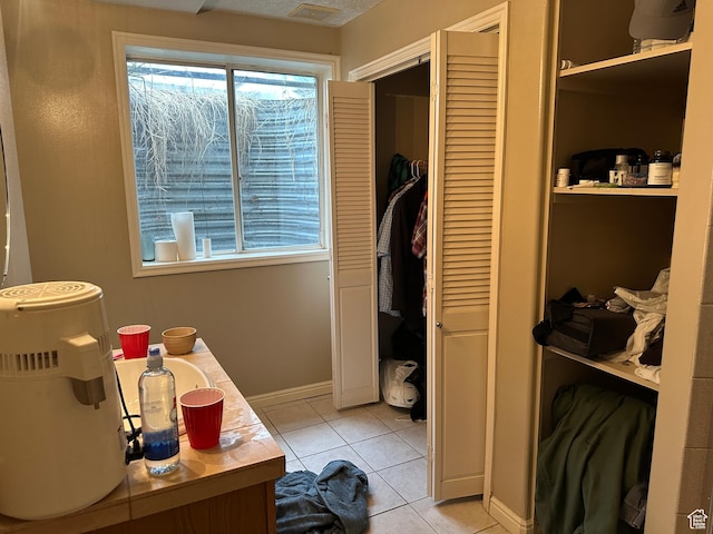 83 E 1820 S, Orem, UT 84058 - bathroom with a closet, tile patterned flooring, healthy amount of natural light, and vanity