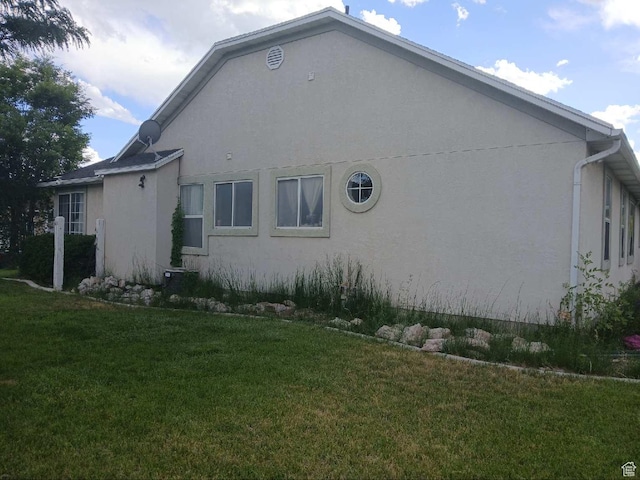 83 E 1820 S, Orem, UT 84058 - view of side of property with stucco siding and a yard