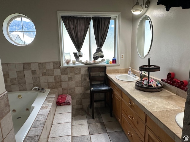 83 E 1820 S, Orem, UT 84058 - bathroom with plenty of natural light, double vanity, a tub with jets, and tile patterned floors