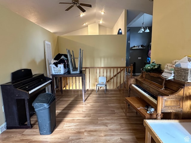 83 E 1820 S, Orem, UT 84058 - living area with ceiling fan, lofted ceiling, wood finished floors, and an upstairs landing