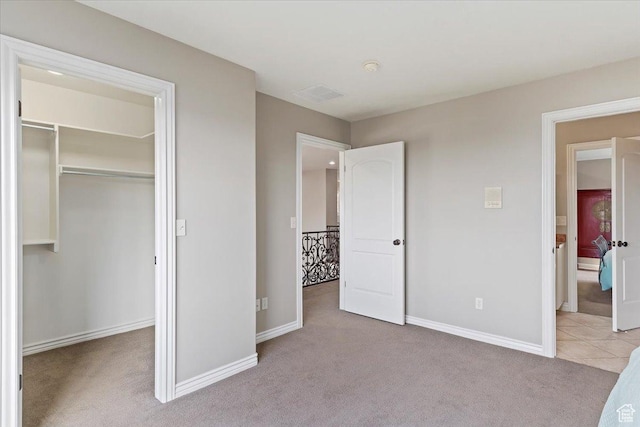 1711 N Compton Rd, Farmington, UT 84025 - unfurnished bedroom featuring light colored carpet and a walk in closet