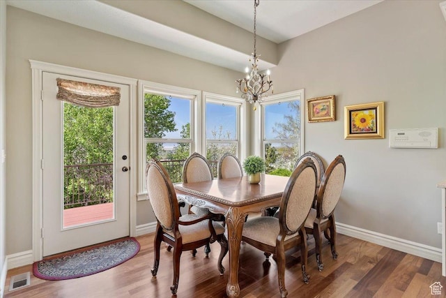 1711 N Compton Rd, Farmington, UT 84025 - dining area featuring a chandelier and wood finished floors