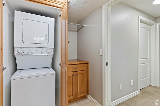 1711 N Compton Rd, Farmington, UT 84025 - washroom featuring stacked washer / drying machine and light carpet