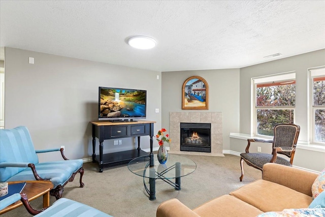 1711 N Compton Rd, Farmington, UT 84025 - living room featuring light carpet, a tile fireplace, and a textured ceiling