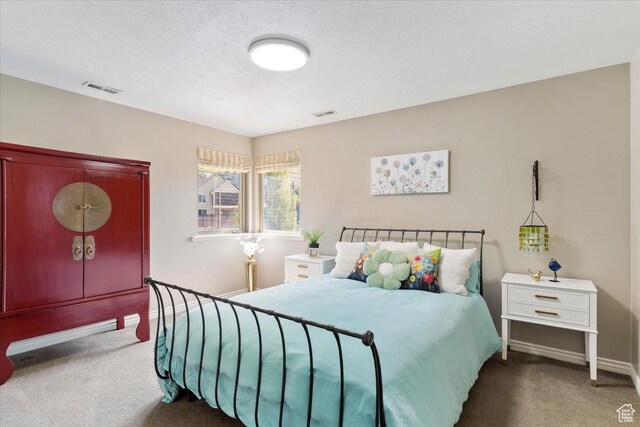1711 N Compton Rd, Farmington, UT 84025 - carpeted bedroom with baseboards and a textured ceiling