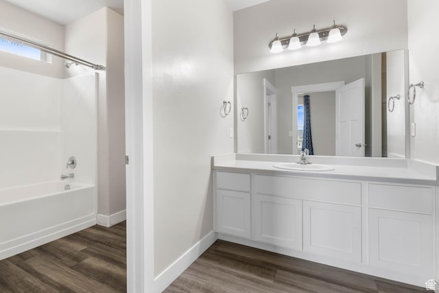 4234 W Mckellen Dr S Unit G301, Herriman, UT 84096 - full bath featuring bathing tub / shower combination, wood finished floors, and vanity