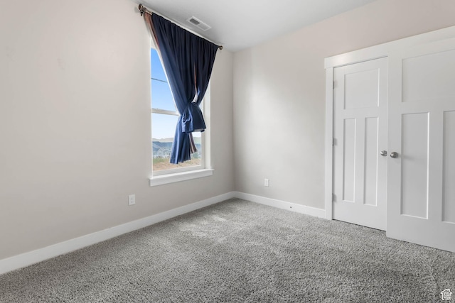 4234 W Mckellen Dr S Unit G301, Herriman, UT 84096 - carpeted empty room with baseboards