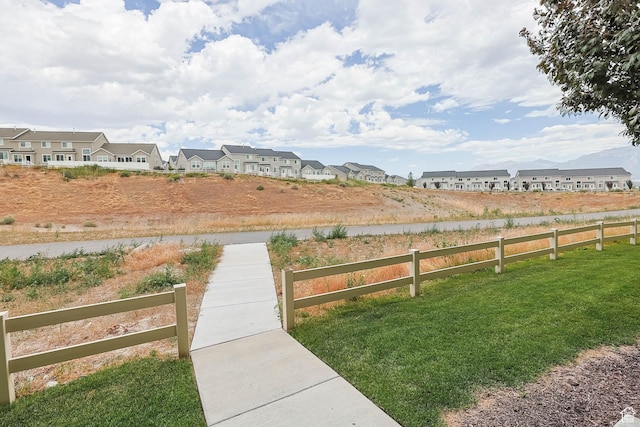 4234 W Mckellen Dr S Unit G301, Herriman, UT 84096 - view of yard with a residential view