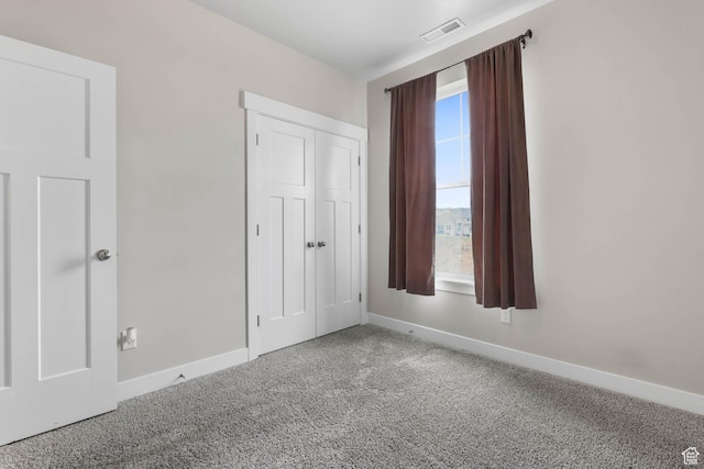 4234 W Mckellen Dr S Unit G301, Herriman, UT 84096 - unfurnished bedroom featuring carpet flooring and a closet