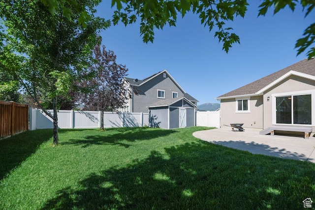 1090 E 770 S, Heber City, UT 84032 - fenced backyard with a storage shed and a patio area