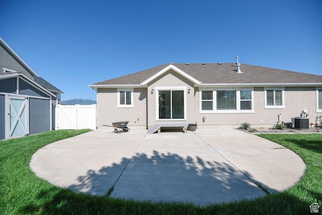 1090 E 770 S, Heber City, UT 84032 - rear view of property with stucco siding, a patio, a shingled roof, and a gate