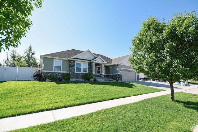 1090 E 770 S, Heber City, UT 84032 - craftsman-style home with stone siding, a garage, driveway, and stucco siding