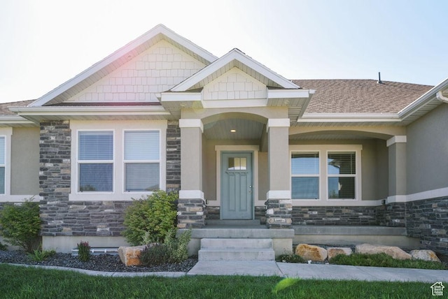 1090 E 770 S, Heber City, UT 84032 - doorway to property with stone siding, stucco siding, and roof with shingles