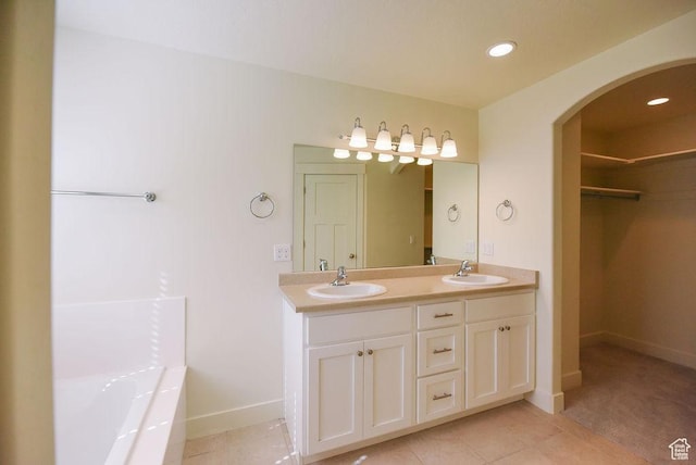 1090 E 770 S, Heber City, UT 84032 - bathroom with double vanity, tile patterned flooring, a spacious closet, a bath, and recessed lighting