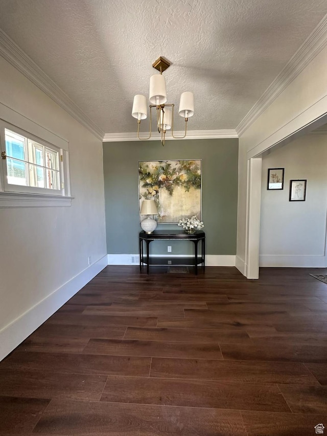 380 N K St, Salt Lake City, UT 84103 - unfurnished dining area with a chandelier, crown molding, a textured ceiling, and dark wood finished floors