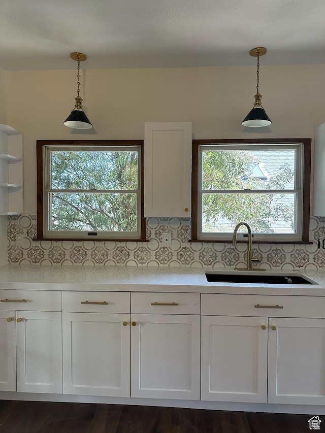 380 N K St, Salt Lake City, UT 84103 - kitchen with light countertops, white cabinets, and pendant lighting