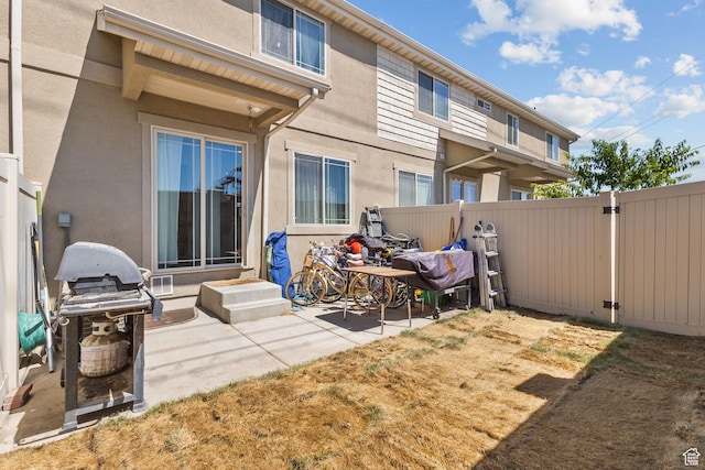 108 S 610 E, American Fork, UT 84003 - back of house with a patio, stucco siding, and entry steps