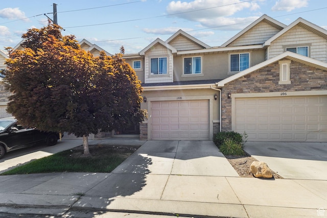 108 S 610 E, American Fork, UT 84003 - multi unit property featuring stone siding, stucco siding, a garage, and concrete driveway