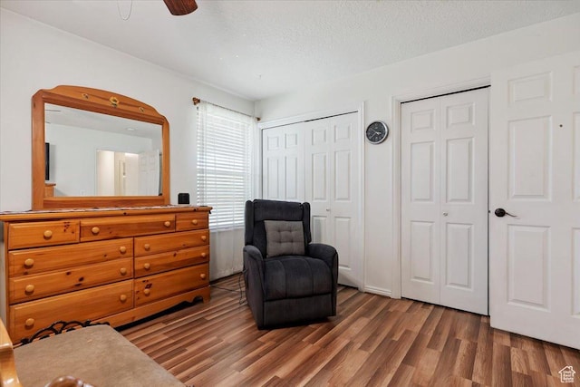 2793 S Cyprus Grove Cir W, Magna, UT 84044 - sitting room featuring wood finished floors and a textured ceiling