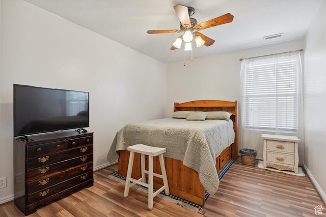2793 S Cyprus Grove Cir W, Magna, UT 84044 - bedroom featuring wood finished floors and a ceiling fan