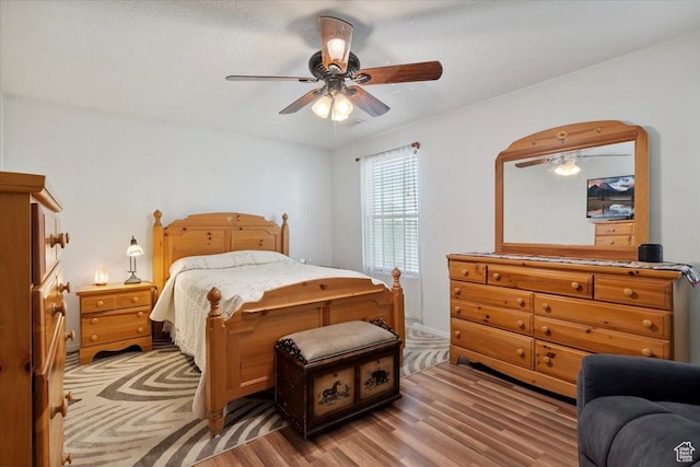 2793 S Cyprus Grove Cir W, Magna, UT 84044 - bedroom featuring light wood-type flooring and a ceiling fan