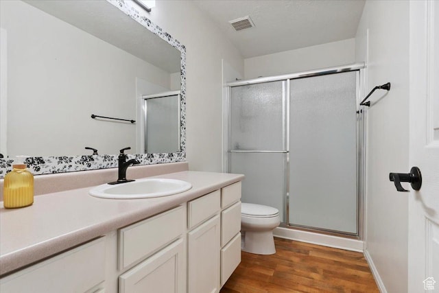 2793 S Cyprus Grove Cir W, Magna, UT 84044 - bathroom featuring wood finished floors, a stall shower, and vanity